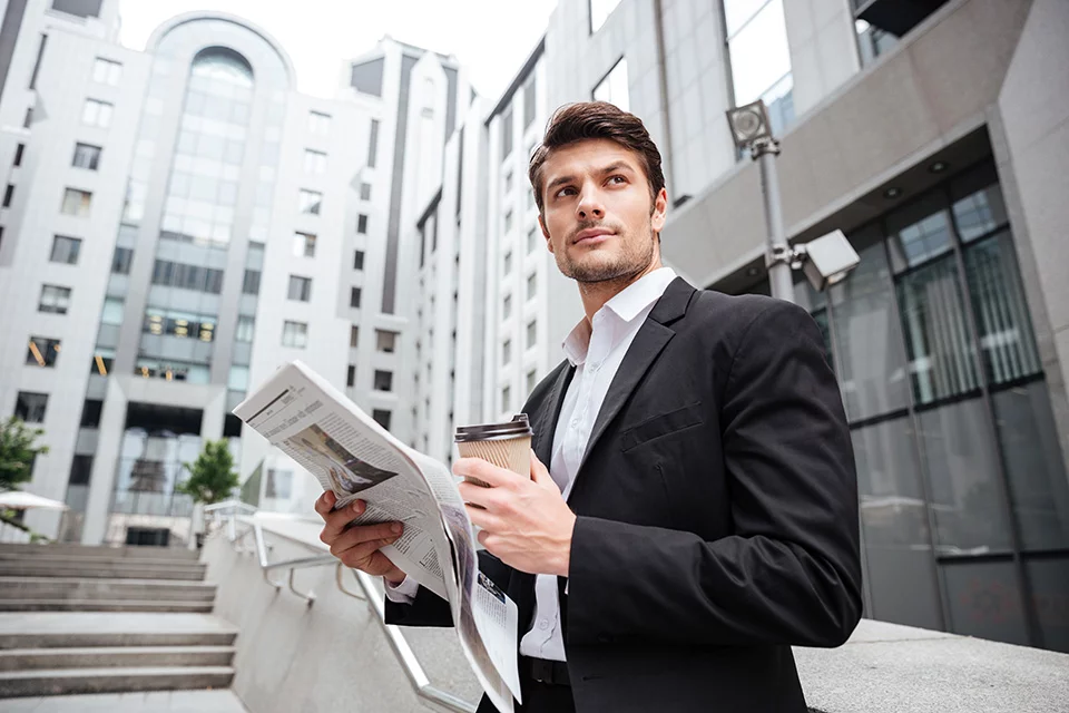 man-in-tailored-suits-reading-newspaper